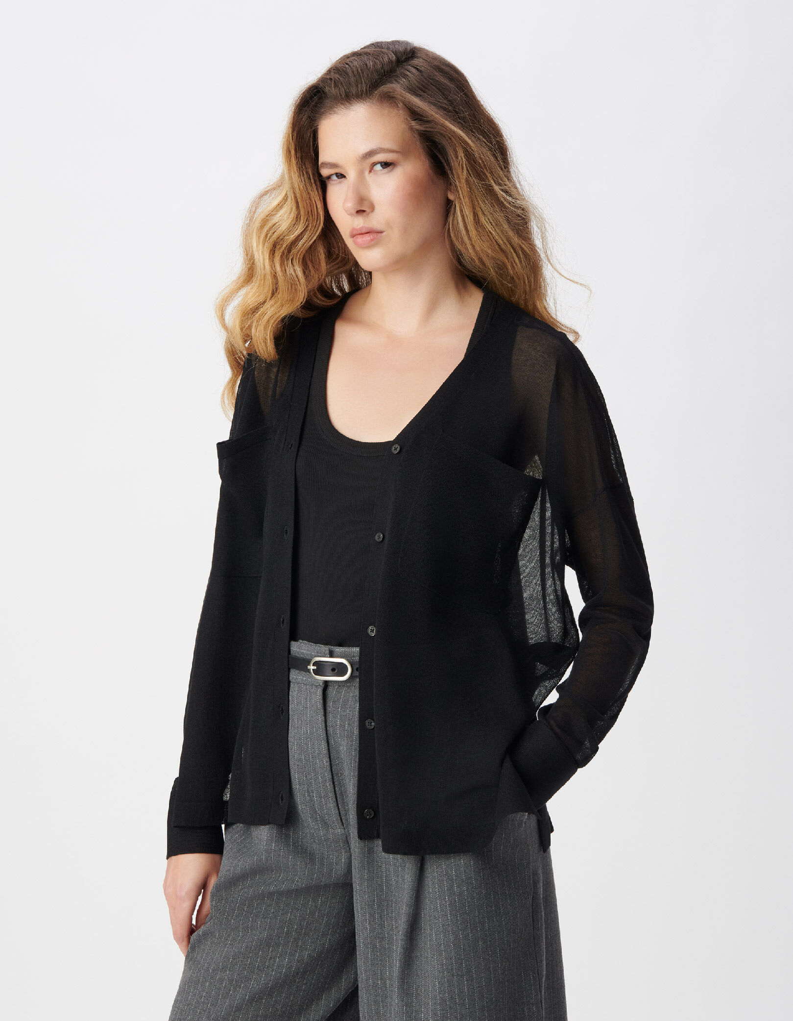Cardigan manches longues noir tricot poches poitrine Femme