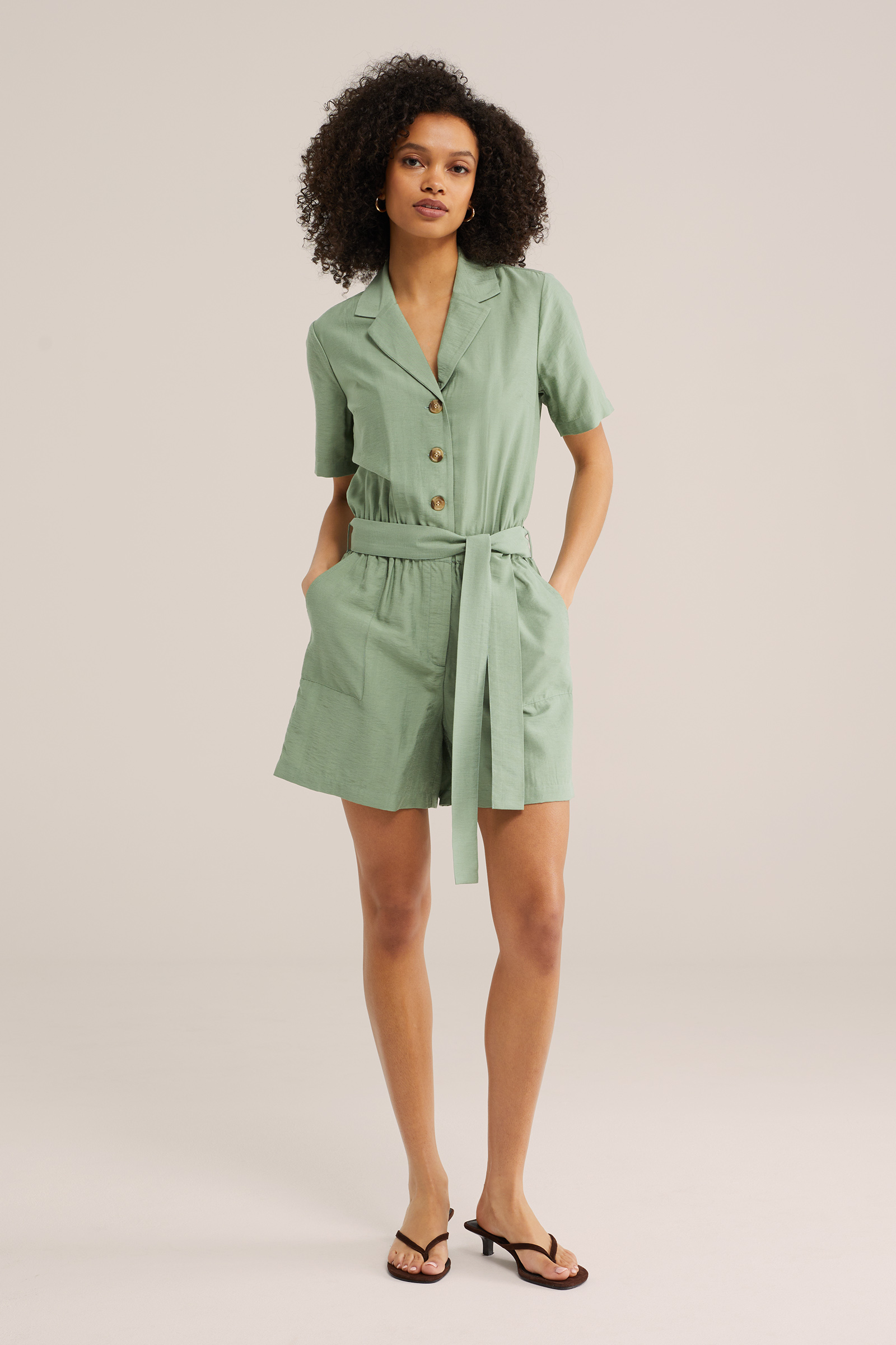 Dames playsuit met ceintuur