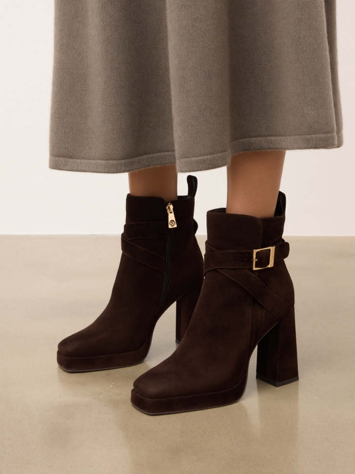 Brown suede heeled and platform boots