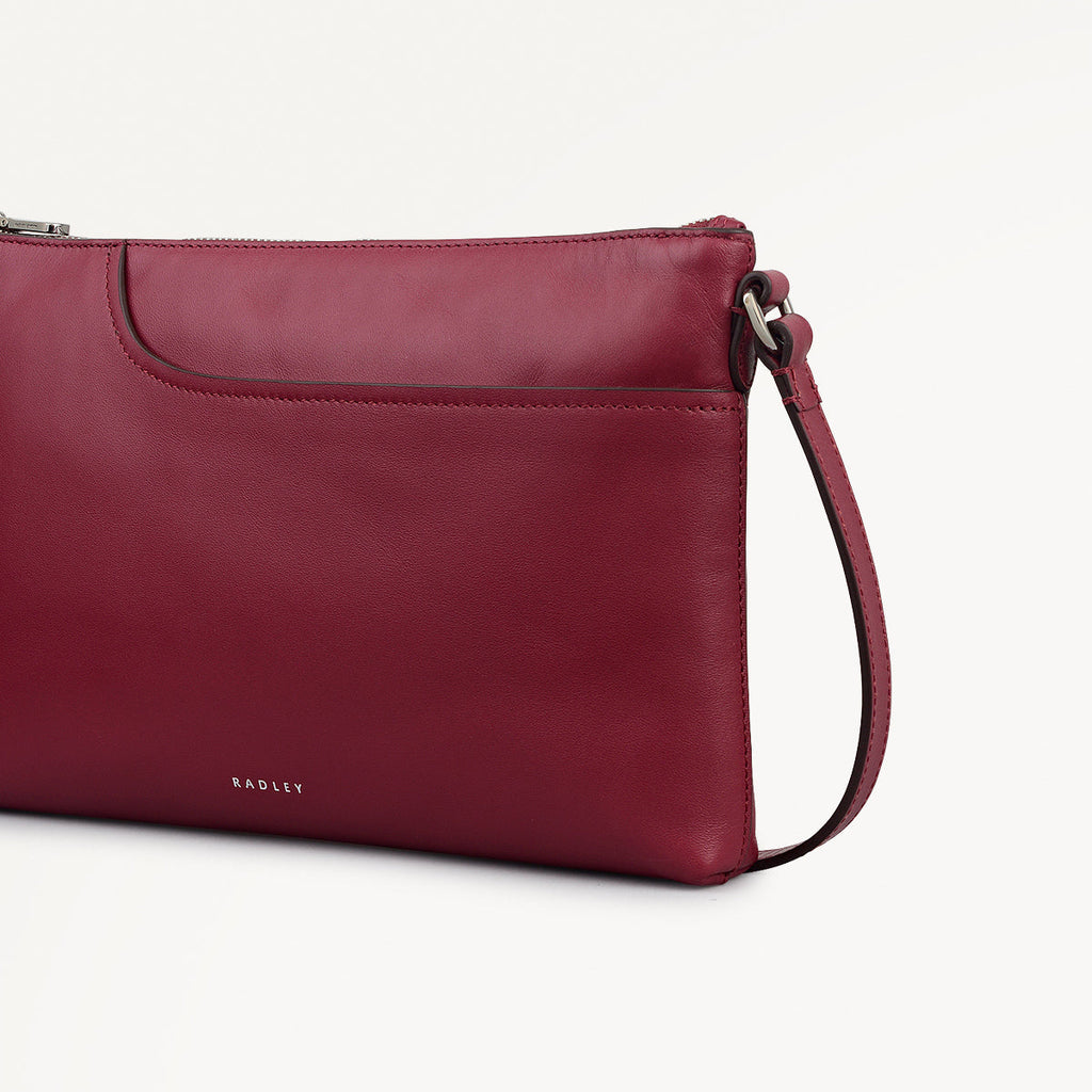 Pockets - Medium Ziptop East-West Cross Body Bag