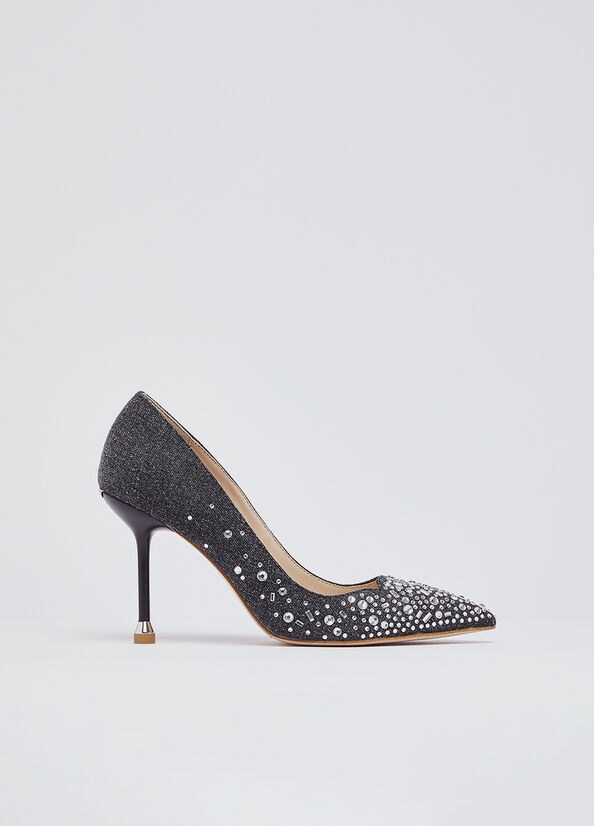 D&eacute;collet&eacute; in denim con pietre gioiello