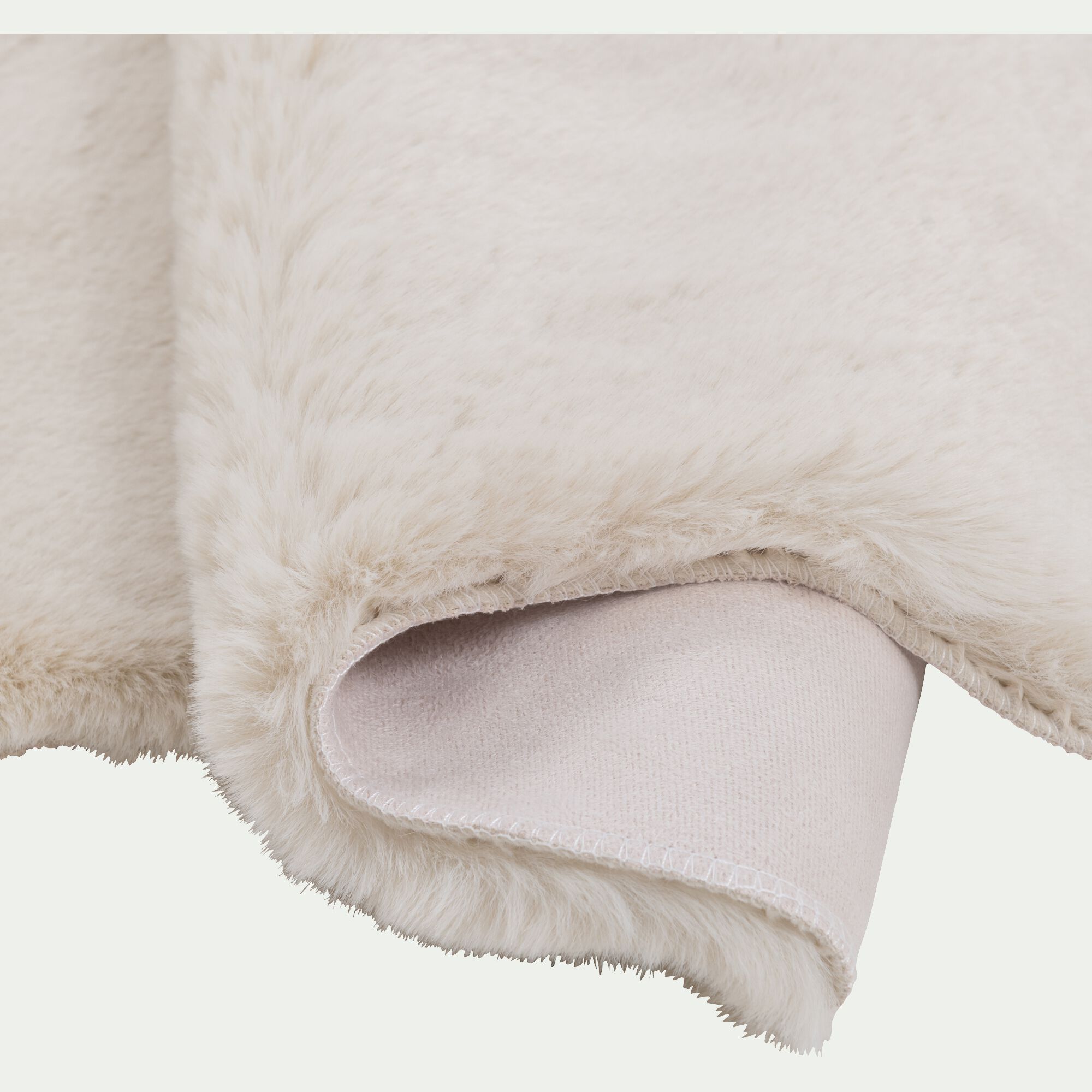 JOUVE - Tapis imitation fourrure - beige 60x90cm