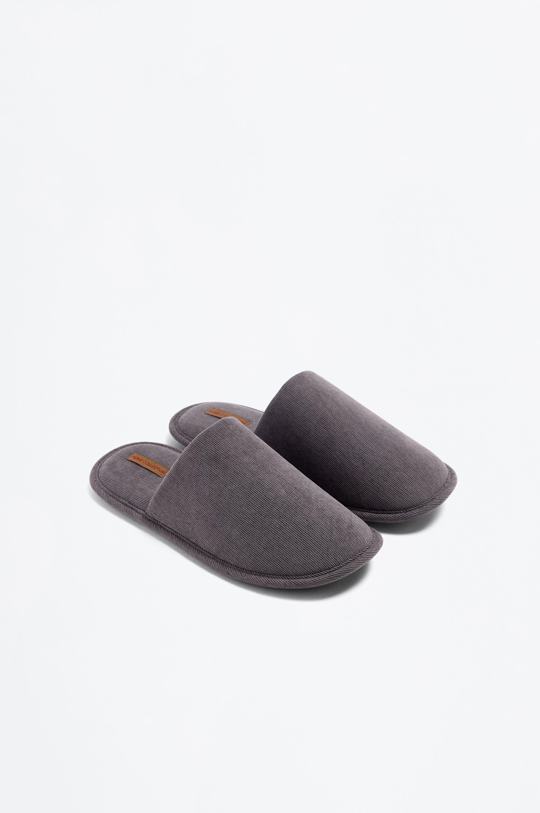 Zapatilla de casa tejido