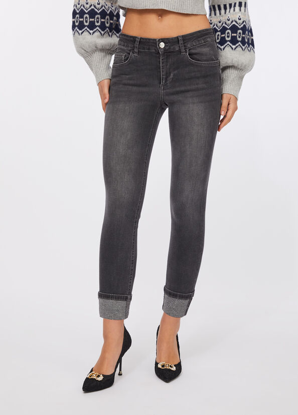 Jeans skinny con risvolto