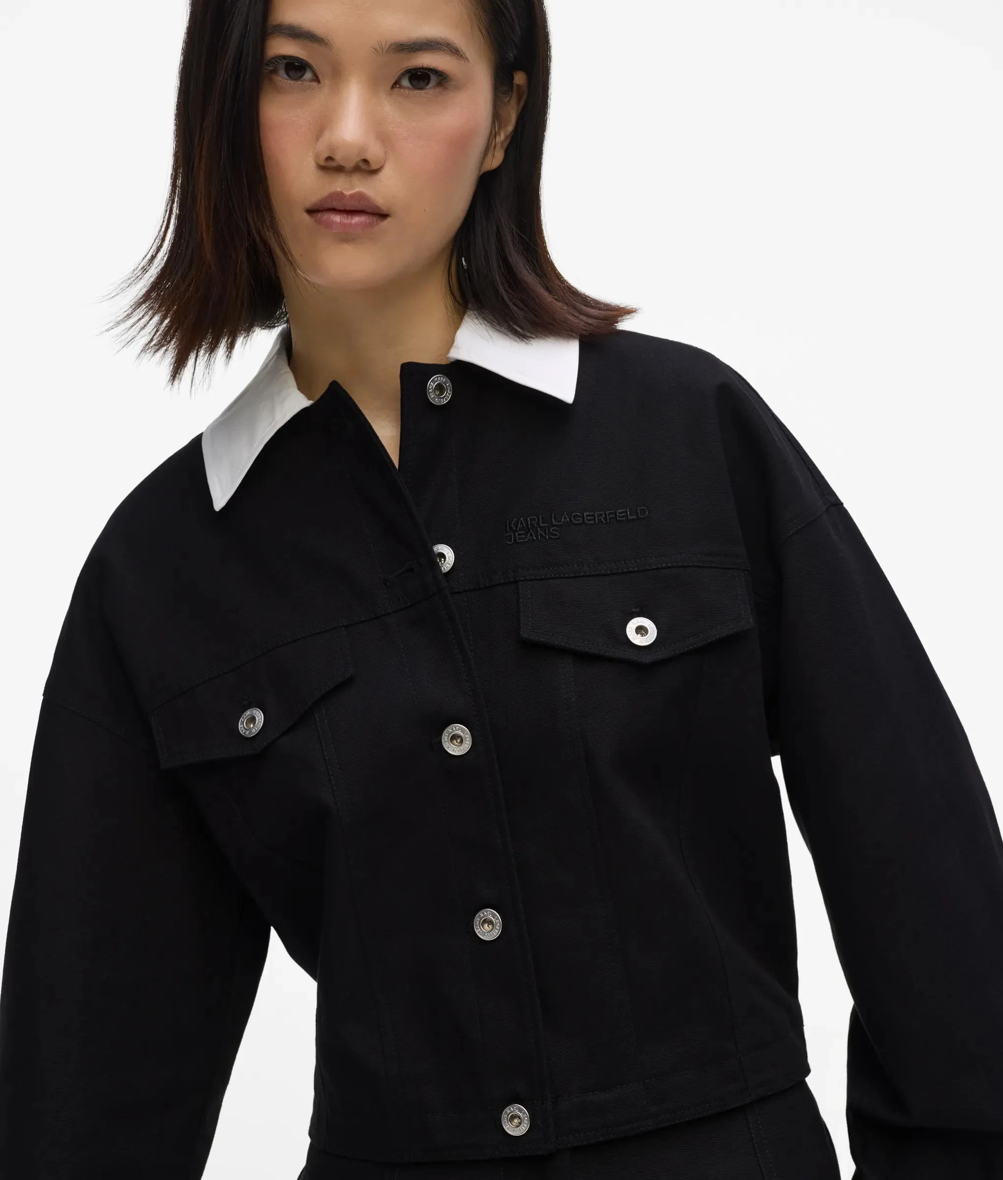 Veste en toile noire et blanche