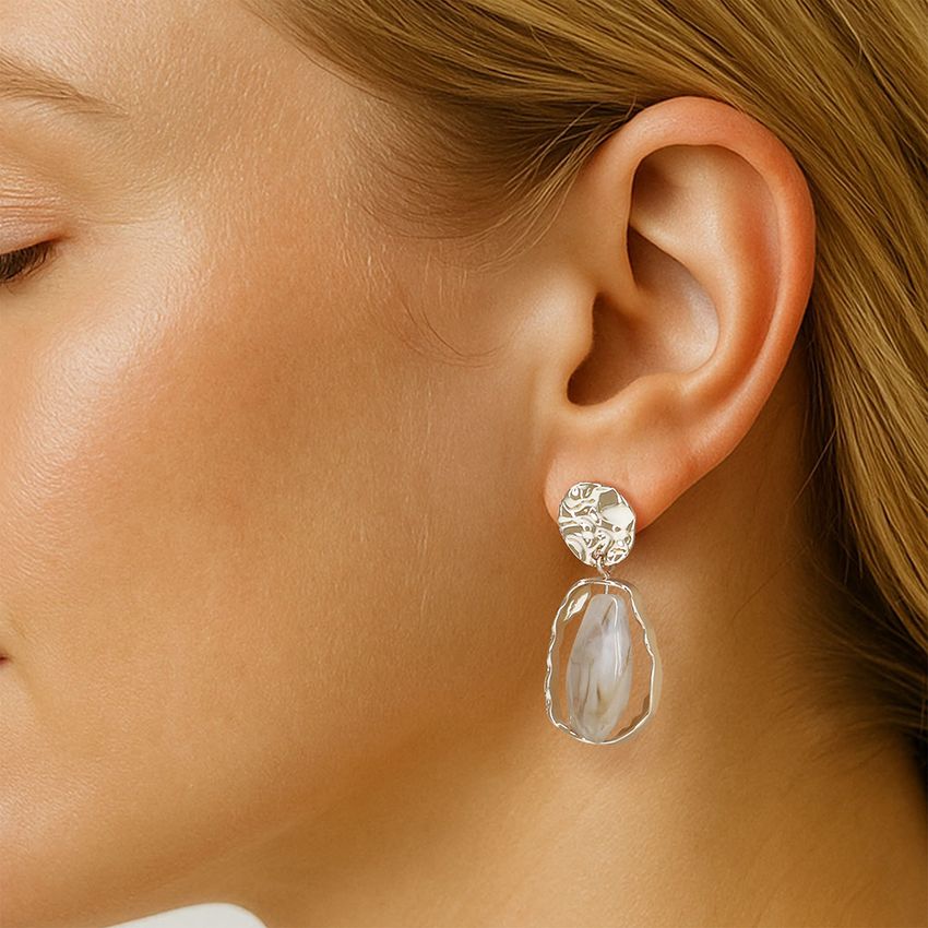 Manfield Goudkleurige oorbellen met steen