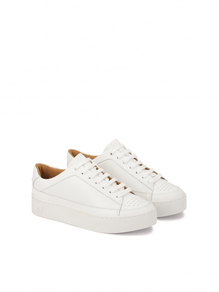 White sneakers with perforation on the nose