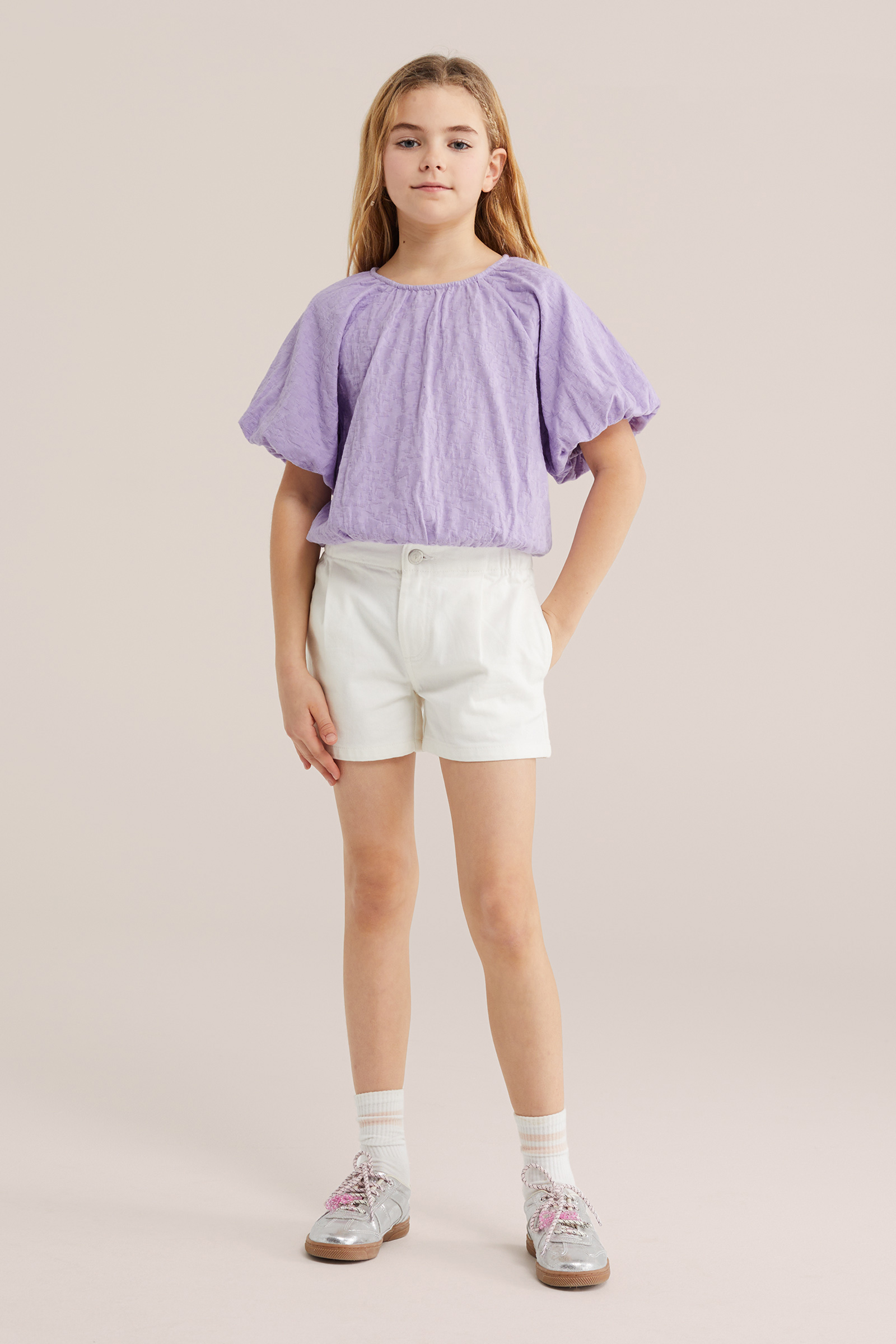 Meisjes top met structuur en ballonmouwen