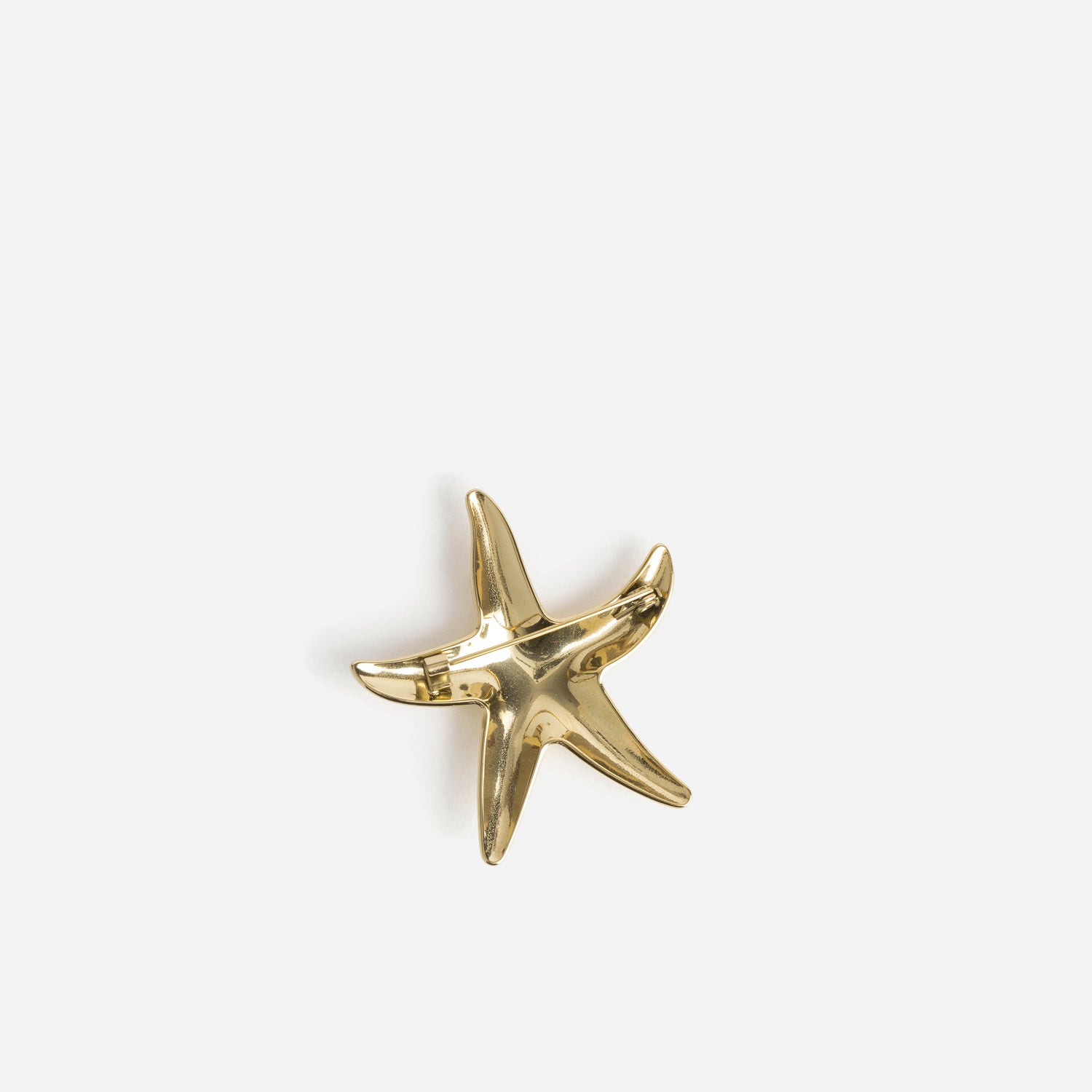 Broche jaune métal forme étoile