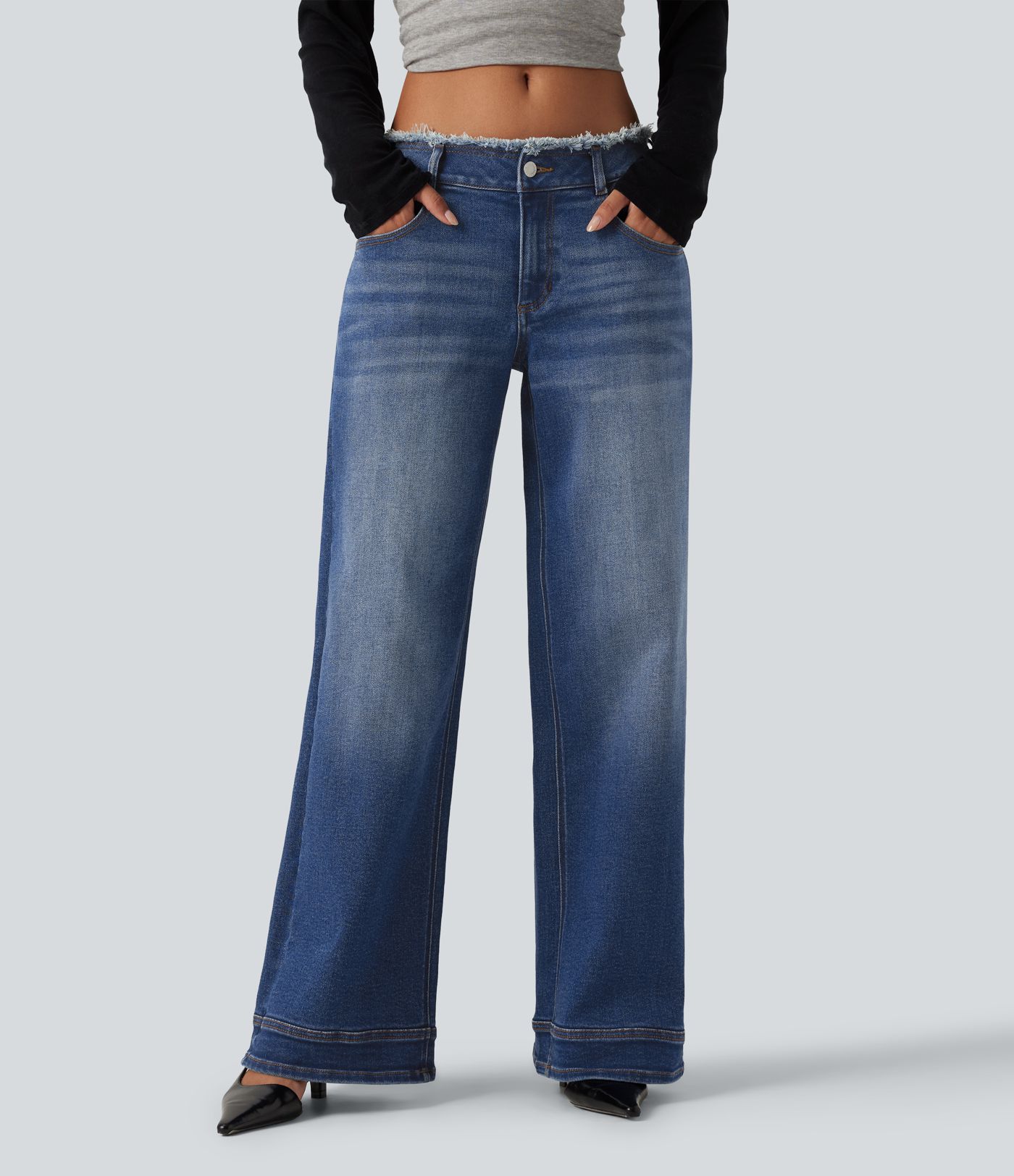 Jean large taille basse à ourlet brut avec poches