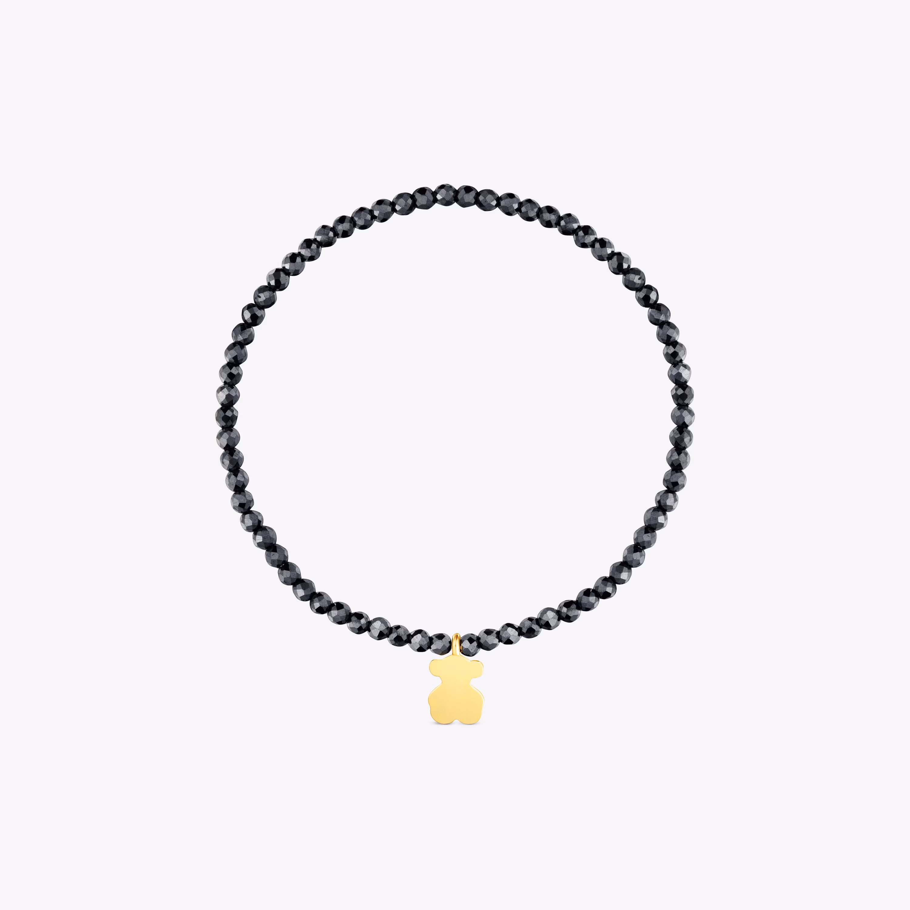 Pulsera elástica con hematita y oso con baño de oro 18 kt sobre plata TOUS Motivos
