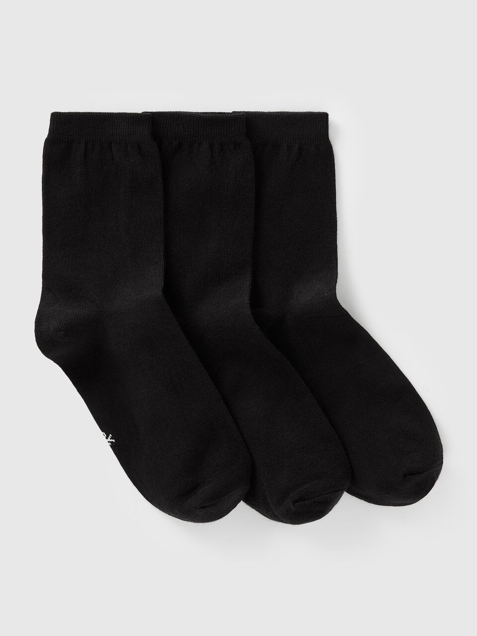 Three pairs of long stretch cotton socks