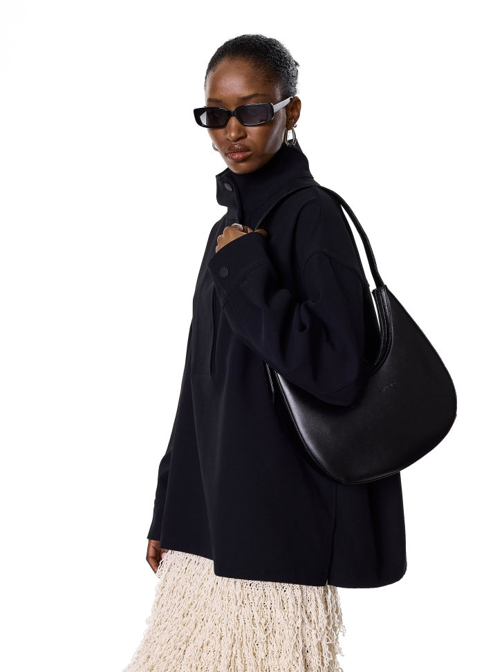 Black shoulder bag with an adjustable handle