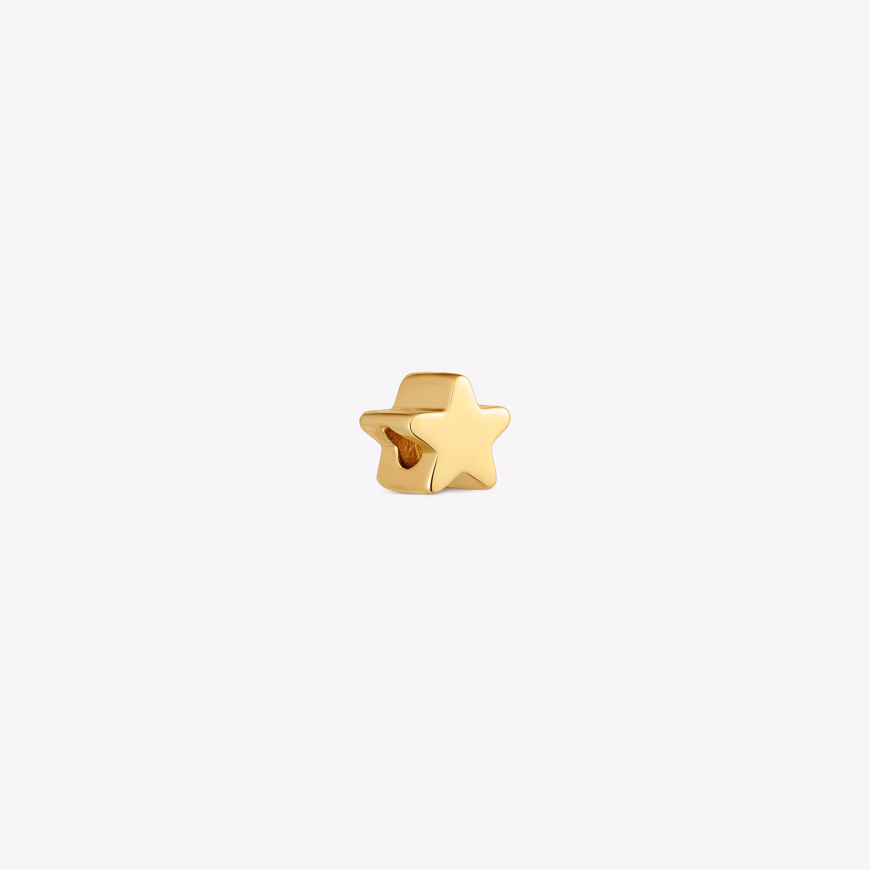 Charm TOUS 1950 estrella con baño de oro 18 kt sobre plata
