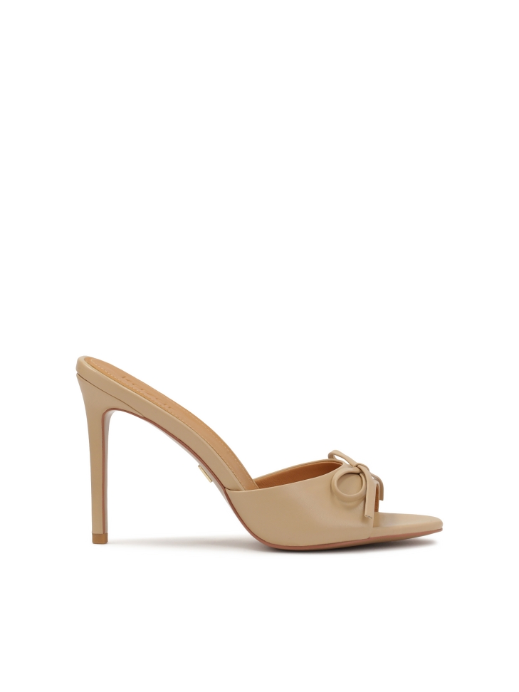 Beige mules with leather bow