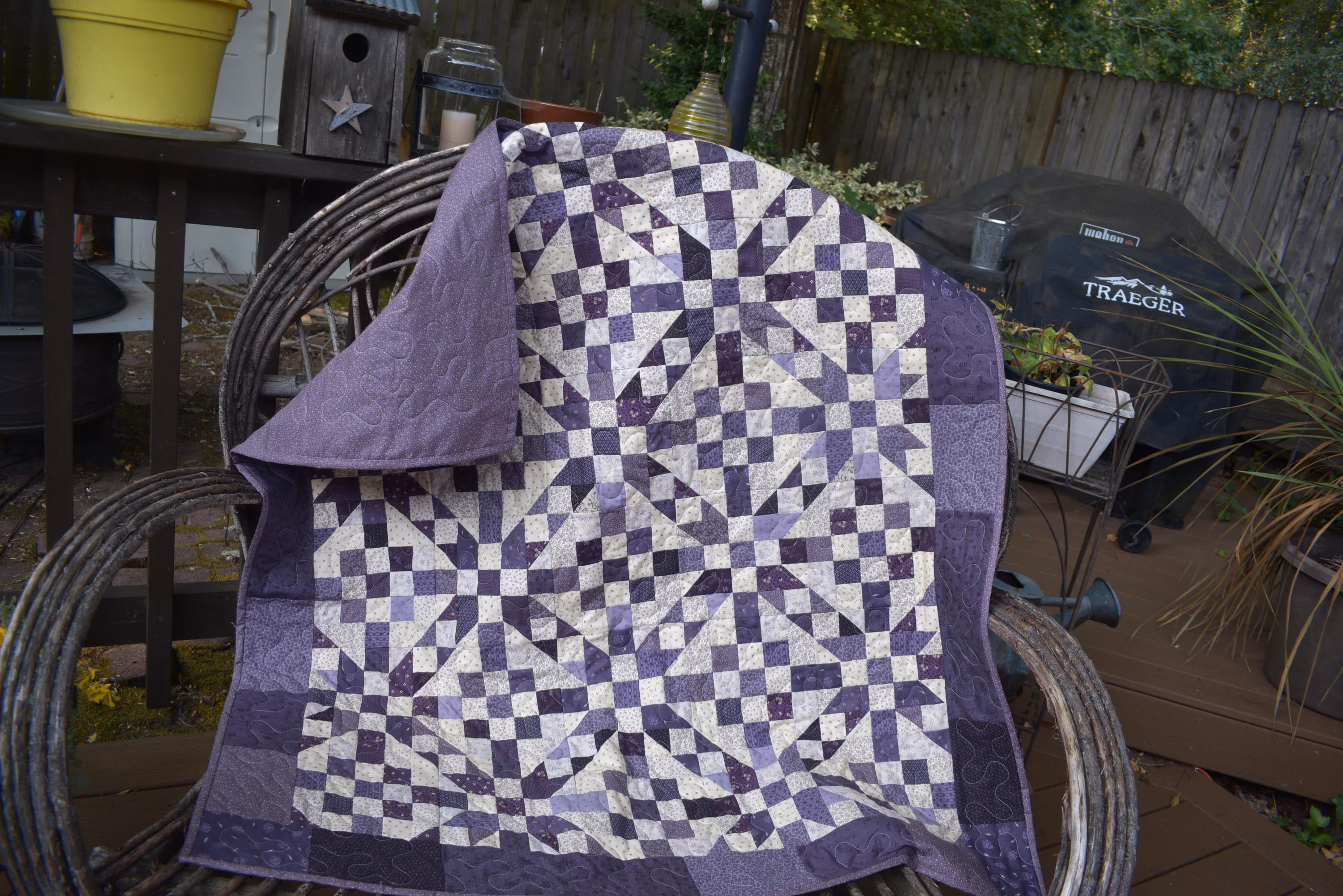 A Quilt using Plumberry Farm Collection by Pam Buda measuring 44 x 50 inches