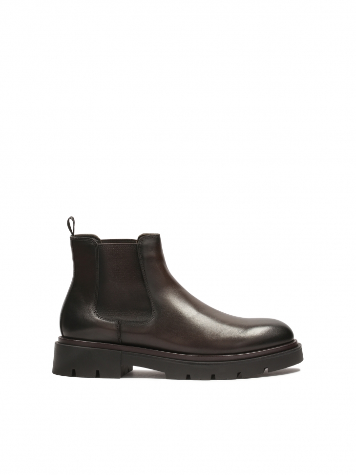 Brown Chelsea boots with a thick sole