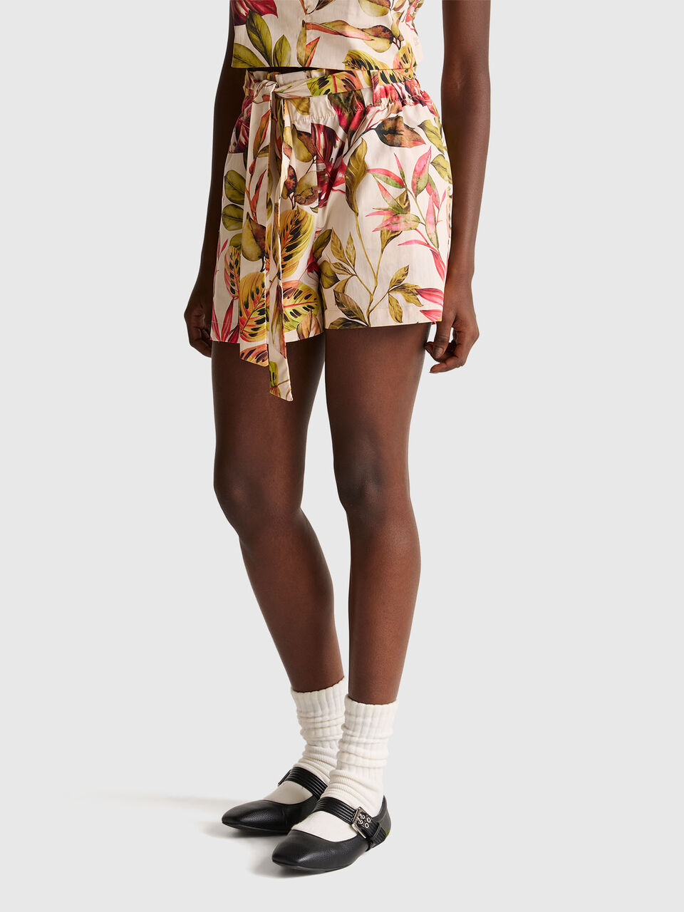 Floral Bermuda shorts with sash
