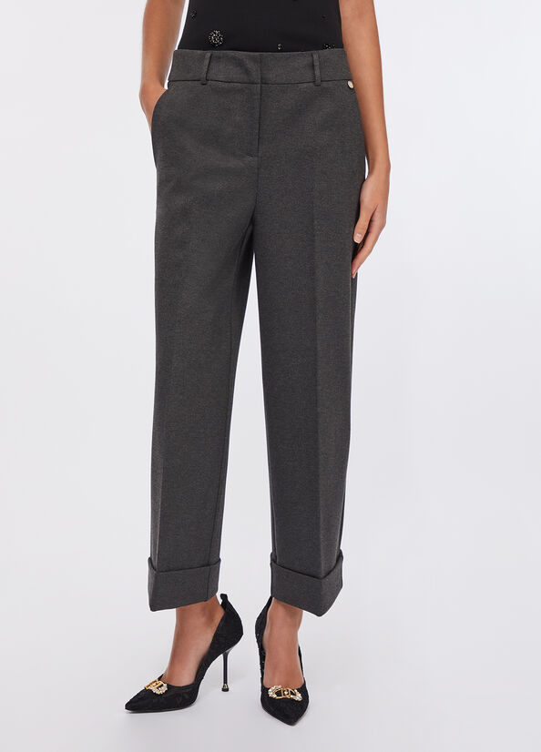 Pantaloni cropped con piega