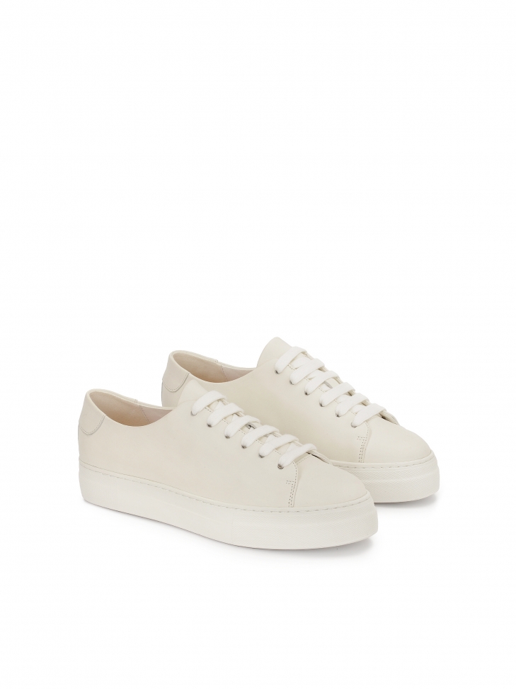 White leather sneakers with a simple upper