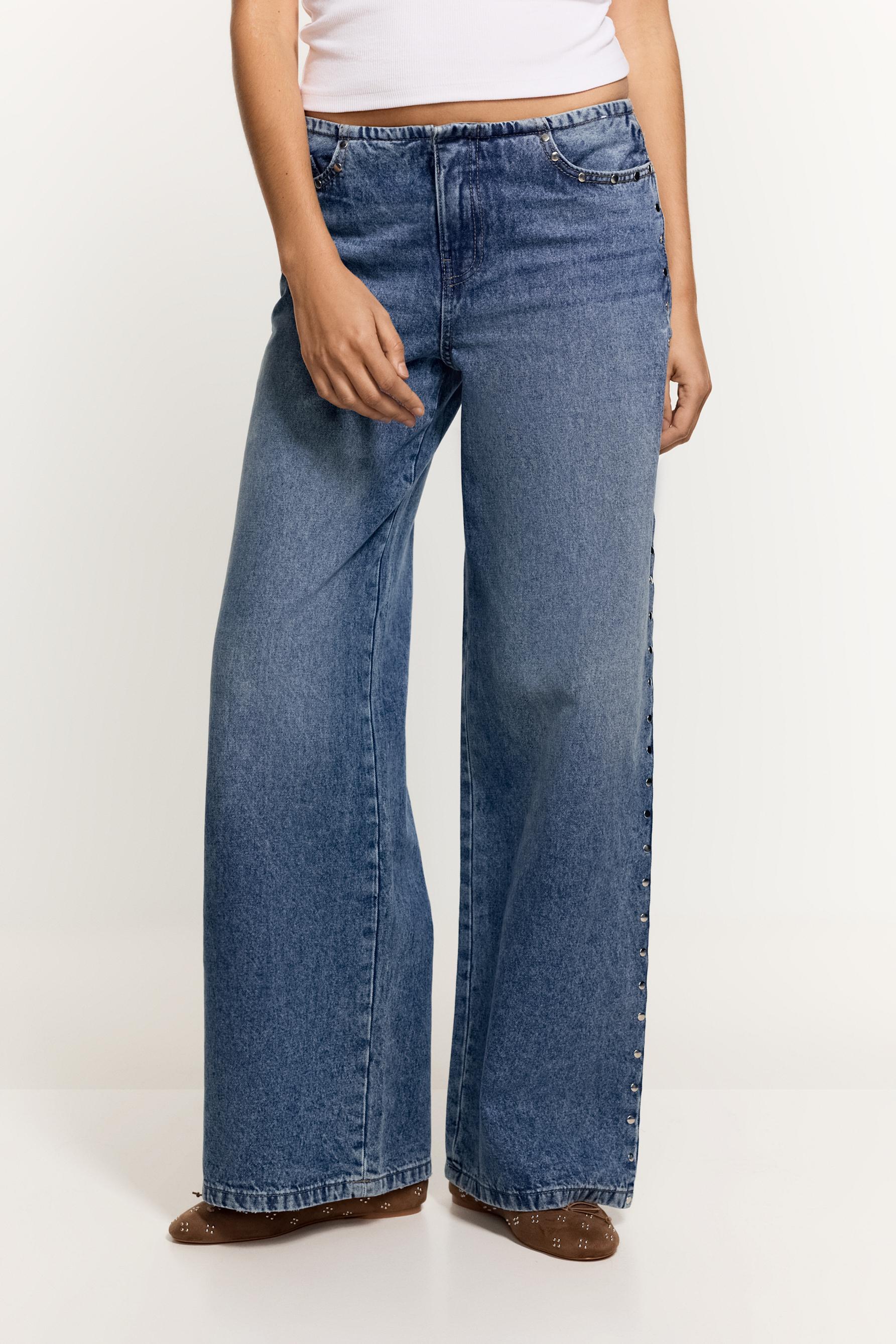 Jeans wide leg sin cintura tachas