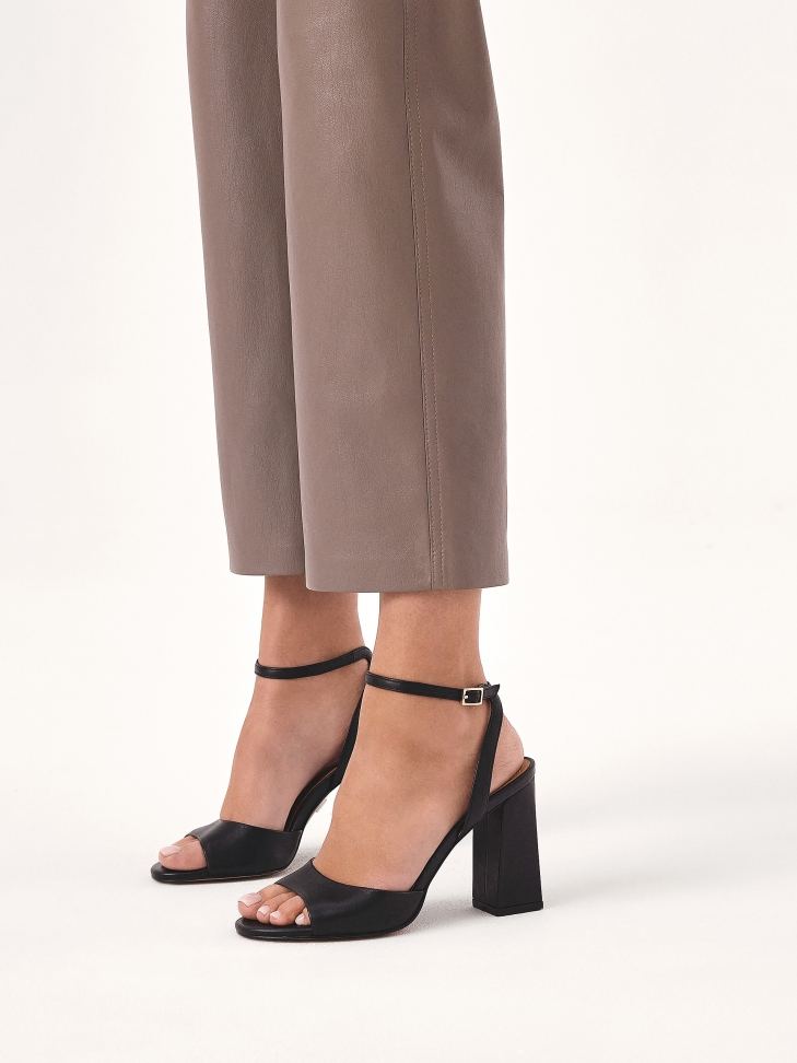 Black sandals with a wide heel
