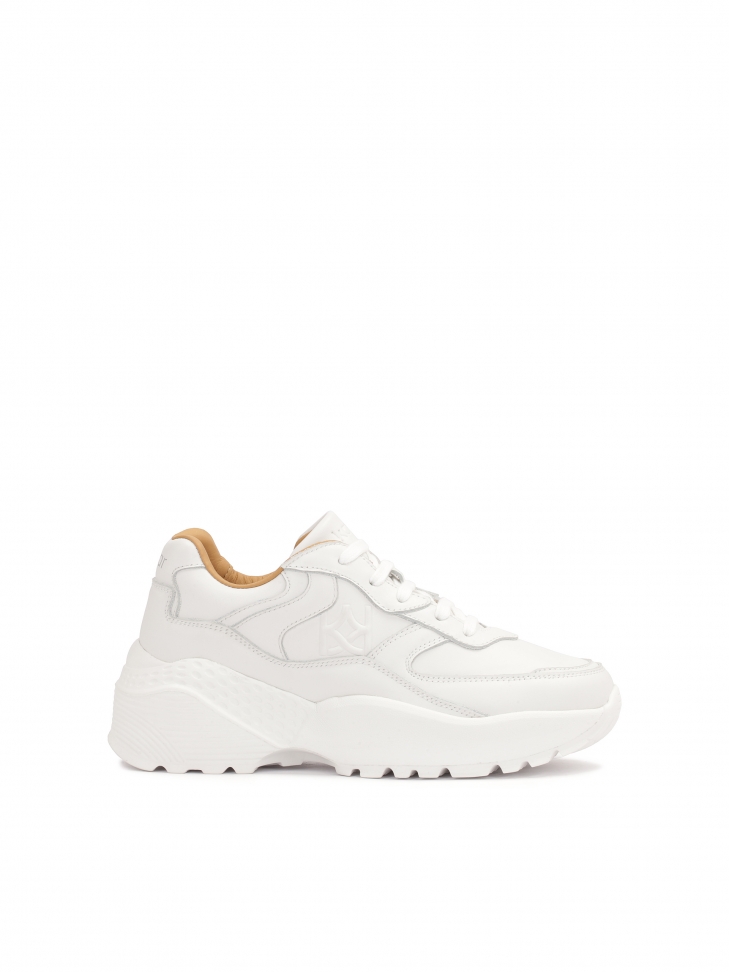 White leather sneakers on a thick sole