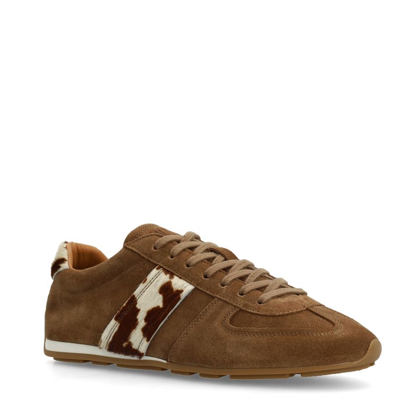 Manfield Bruine suède sneakers met cow print vacht