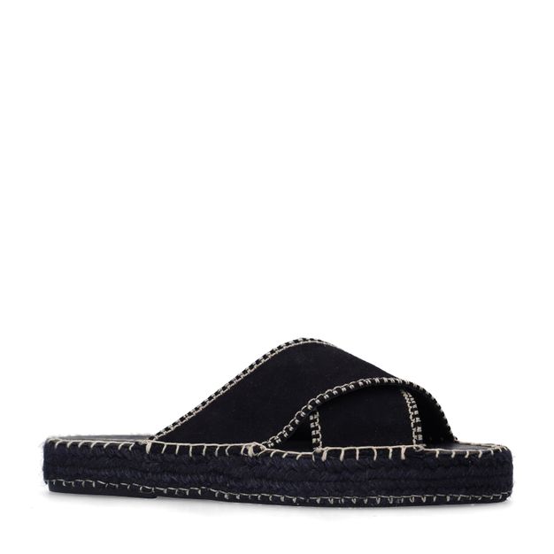 Zwarte suède slippers met witte stiksels