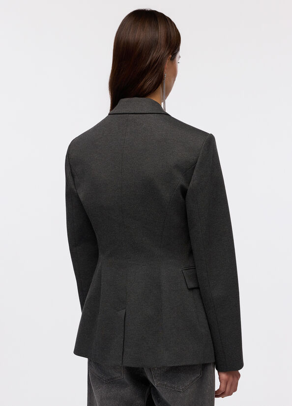 Blazer con spilla gioiello