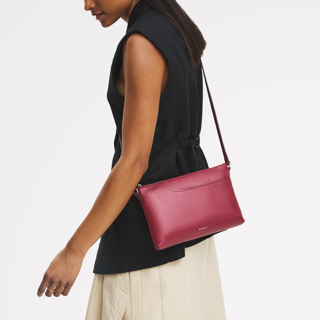Pockets - Medium Ziptop East-West Cross Body Bag