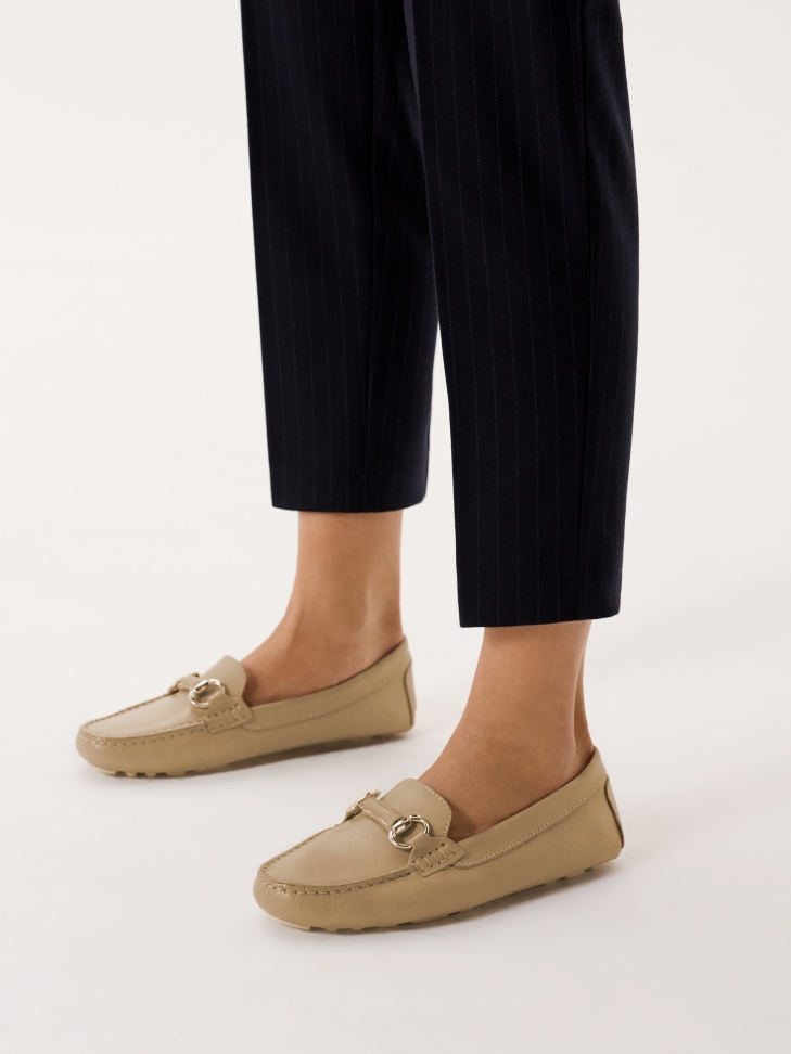 Leather moccasins with metal buckle