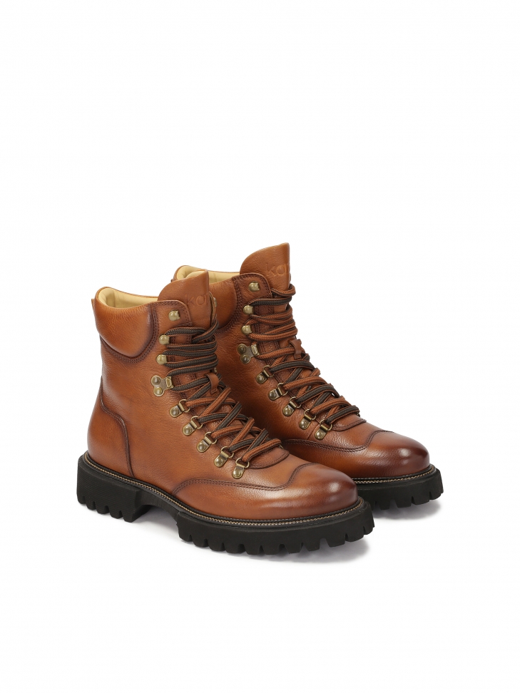 Brown men's boots with metal hooks