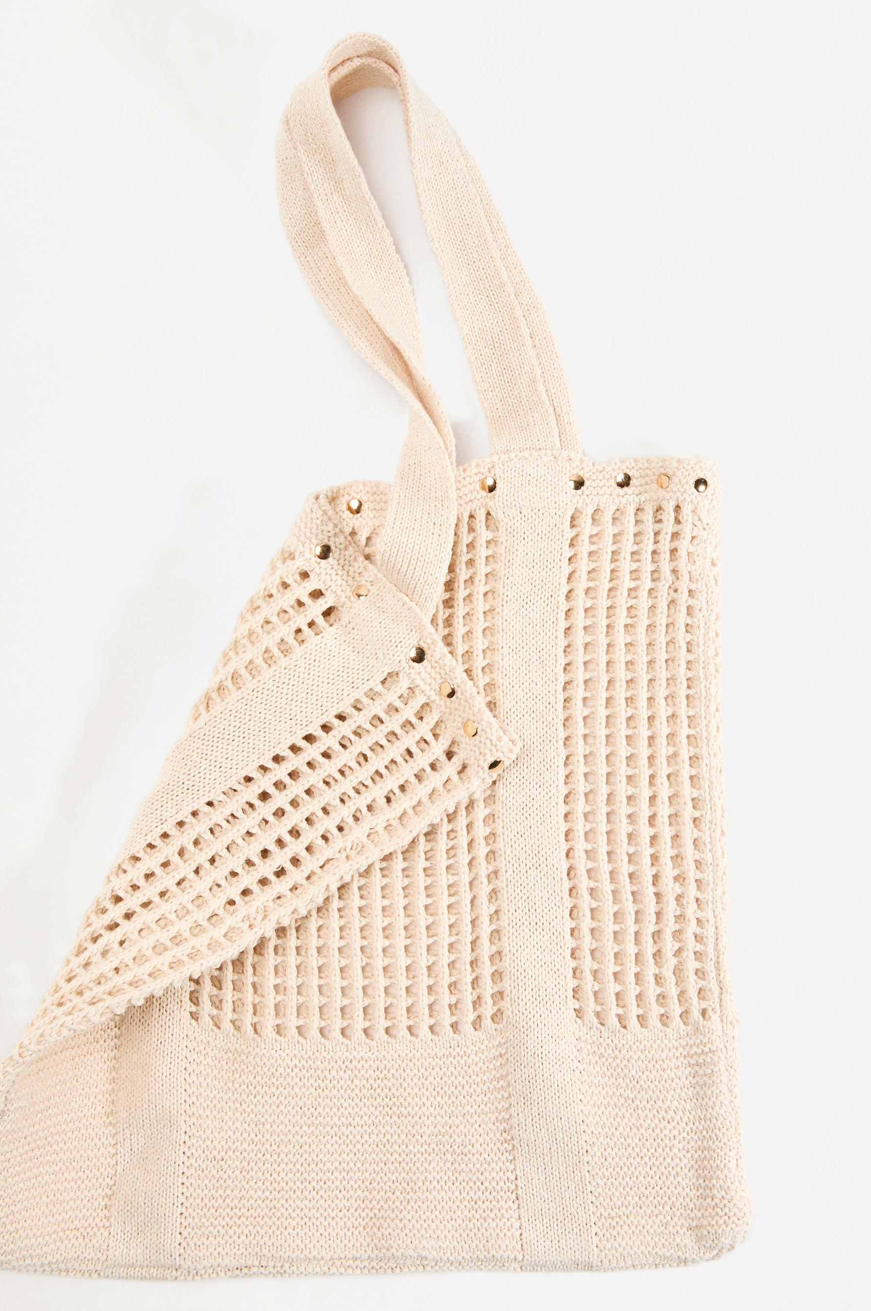 Bolso crochet tachas
