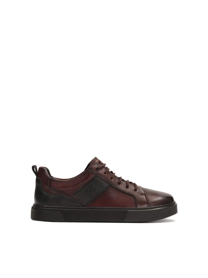 Maroon sneakers with perforated upper
