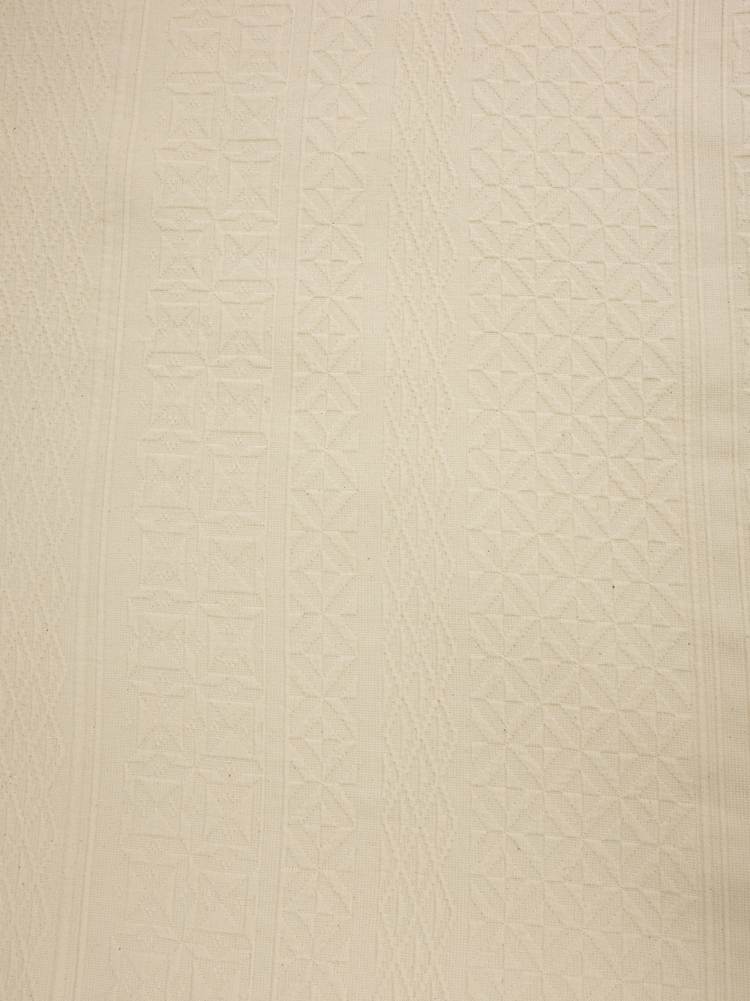 Copriletto in cotone lavato tinto filo con decoro in rilievo Portofino