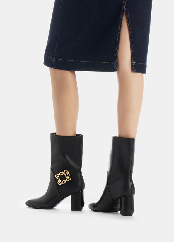Stivaletti con tacco largo