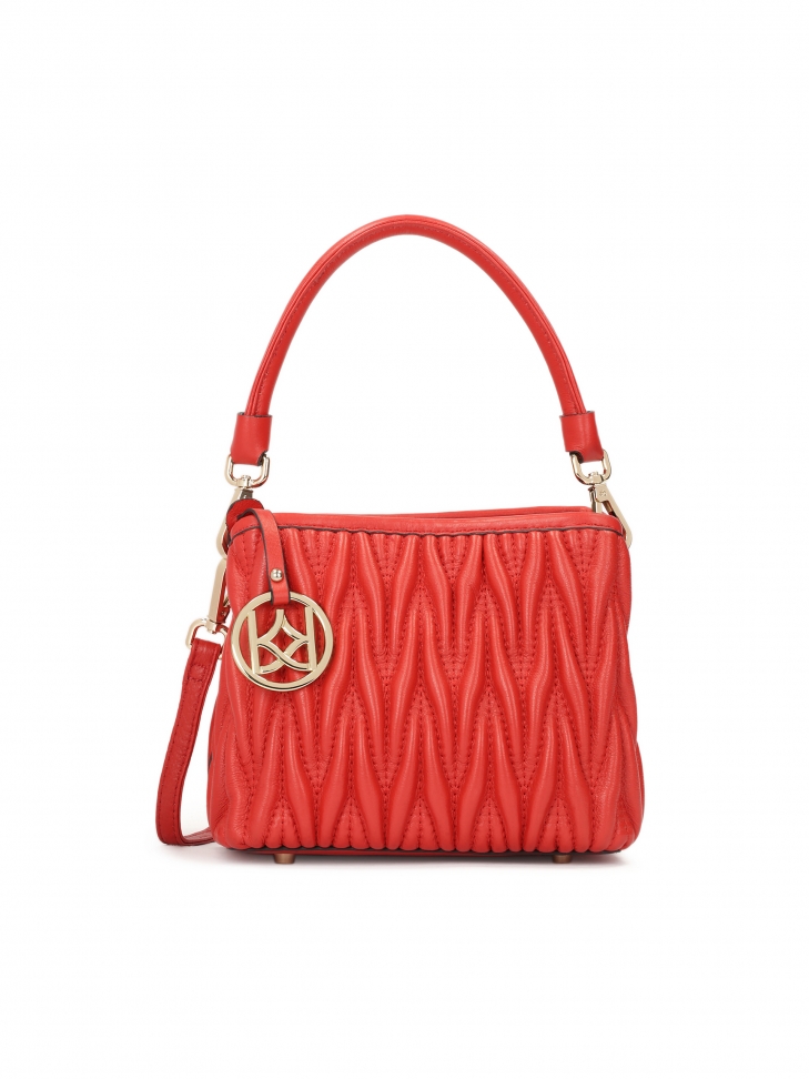 Red quilted handbag with hand grip