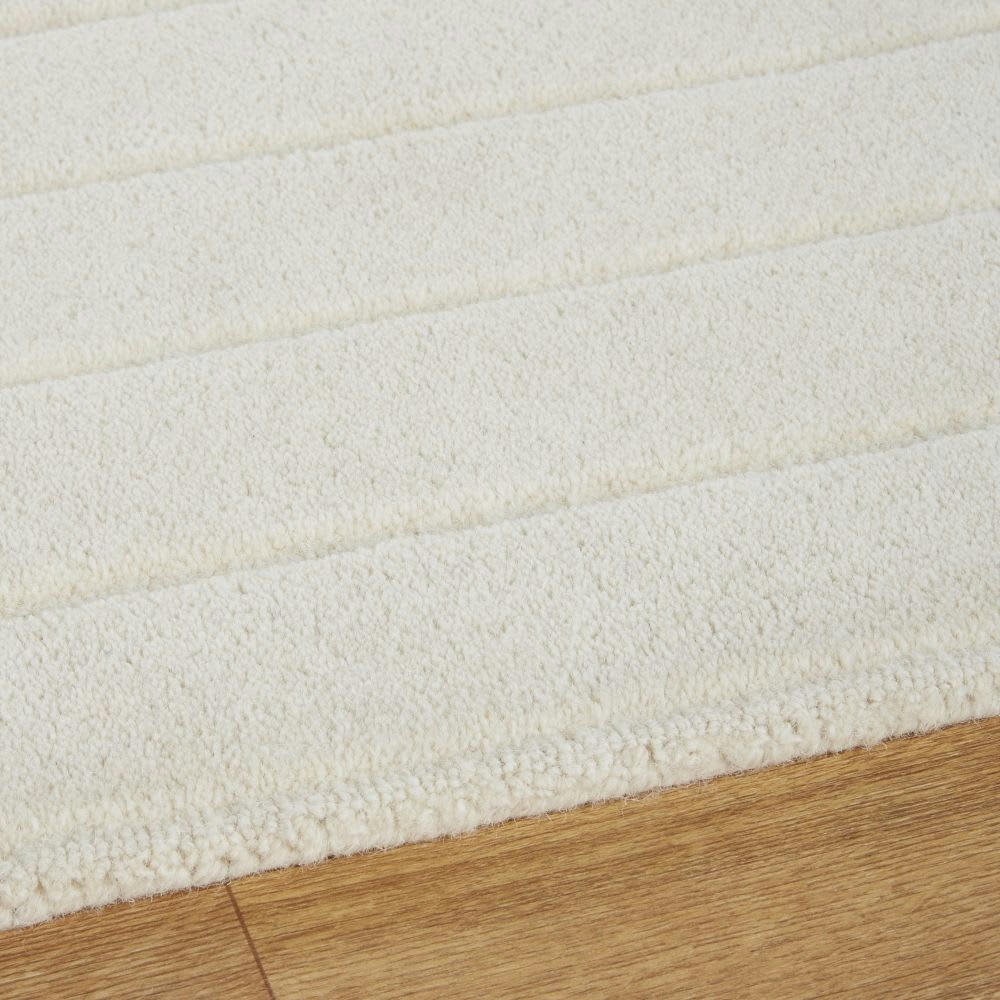 MAGDALENA - Tapis en laine tissée et ciselée motifs ovales écrus 140x200