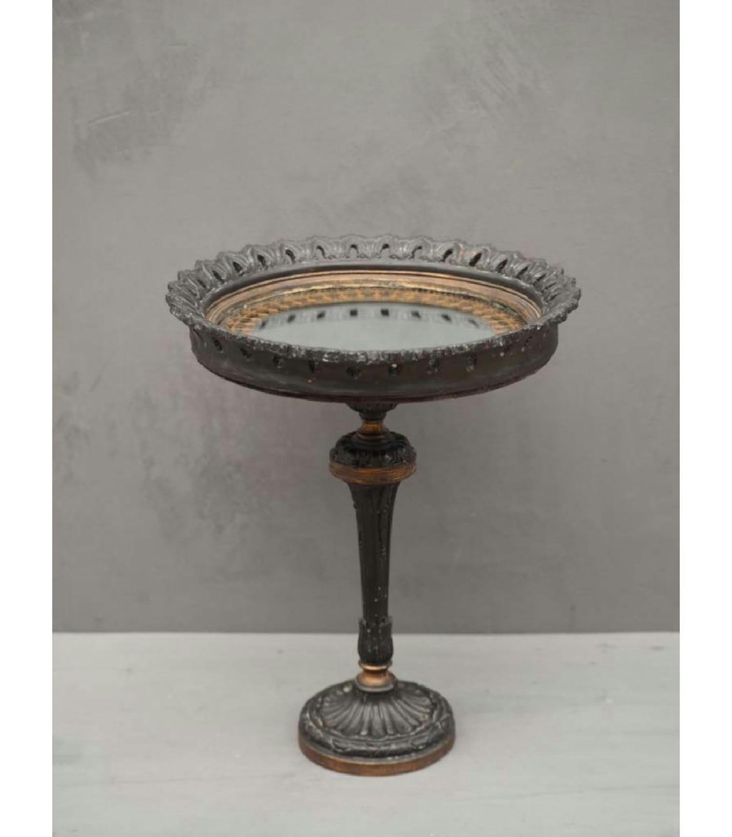 ROND - Présentoir sur pied avec fond miroir noir et doré patiné