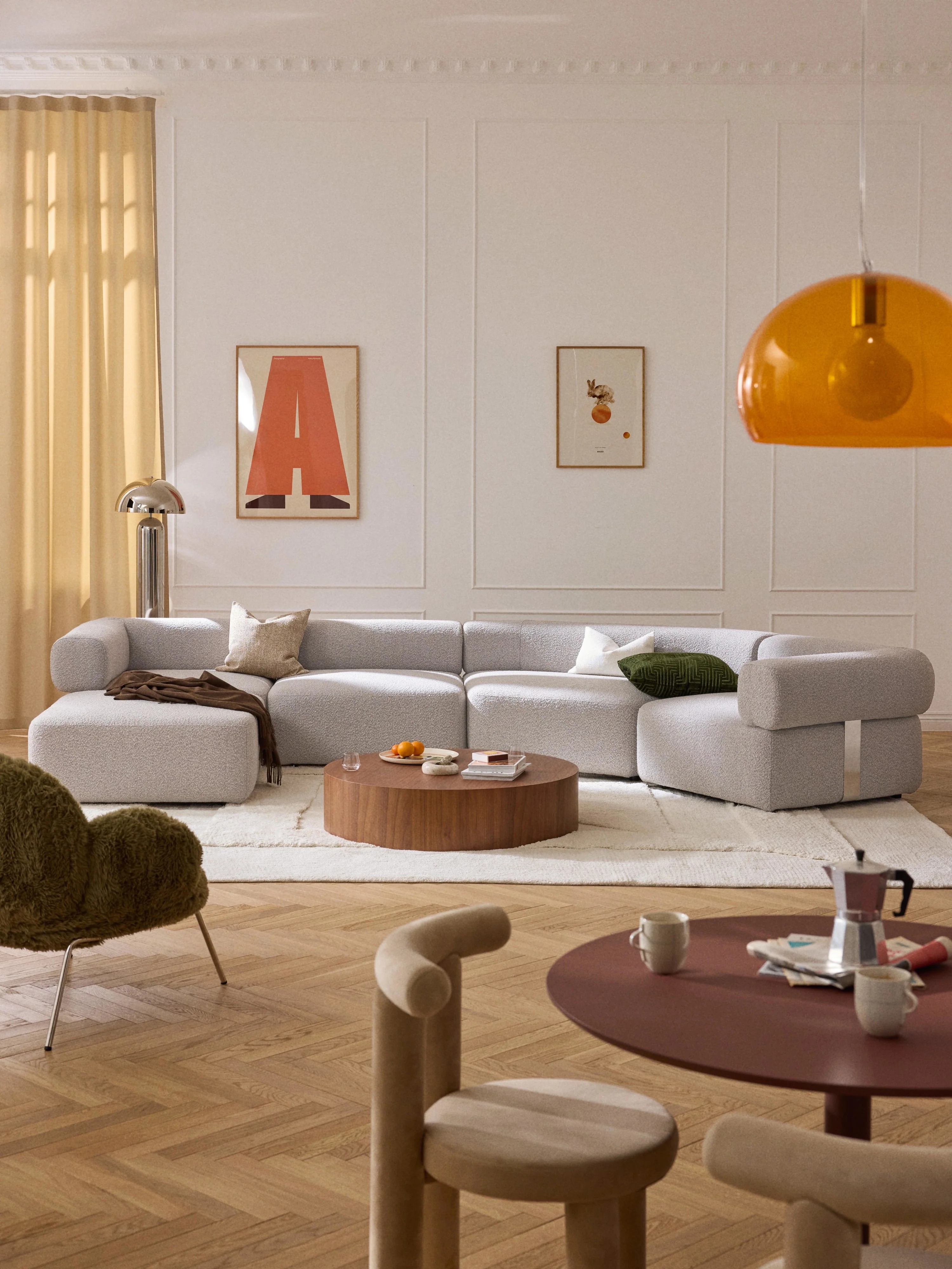Großes modulares Bouclé-Sofa Anton mit Hocker (links/rechts)