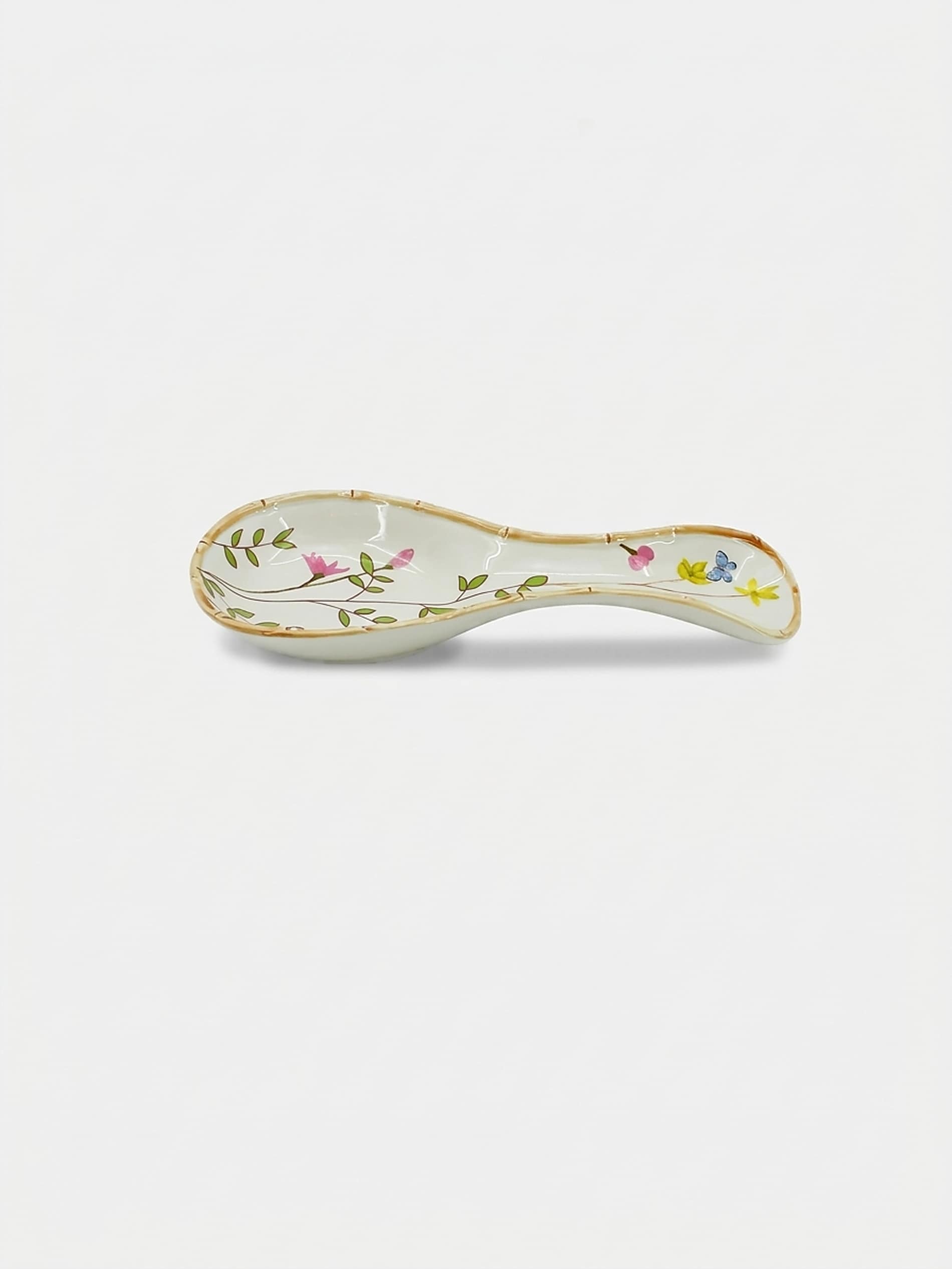 Ceramiczna podstawka pod łyżkę z motywem kwiatowym