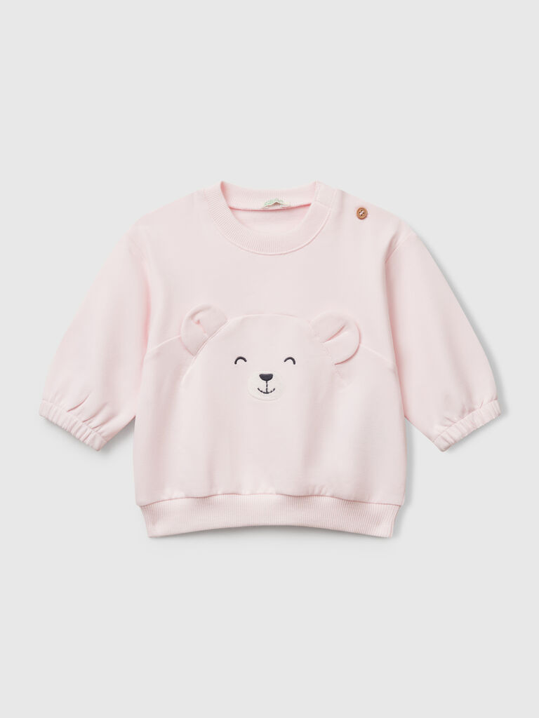 Sweatshirt with embroidery and patches