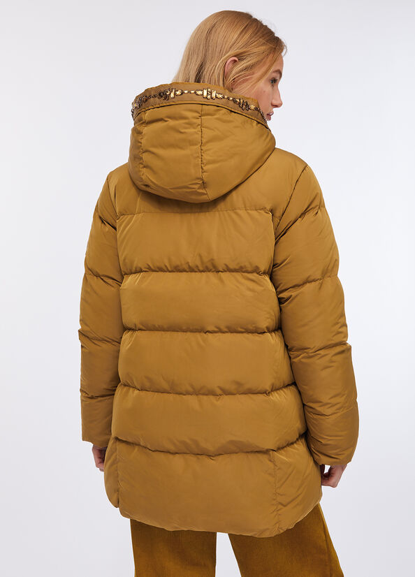 Piumino con ricami gioiello