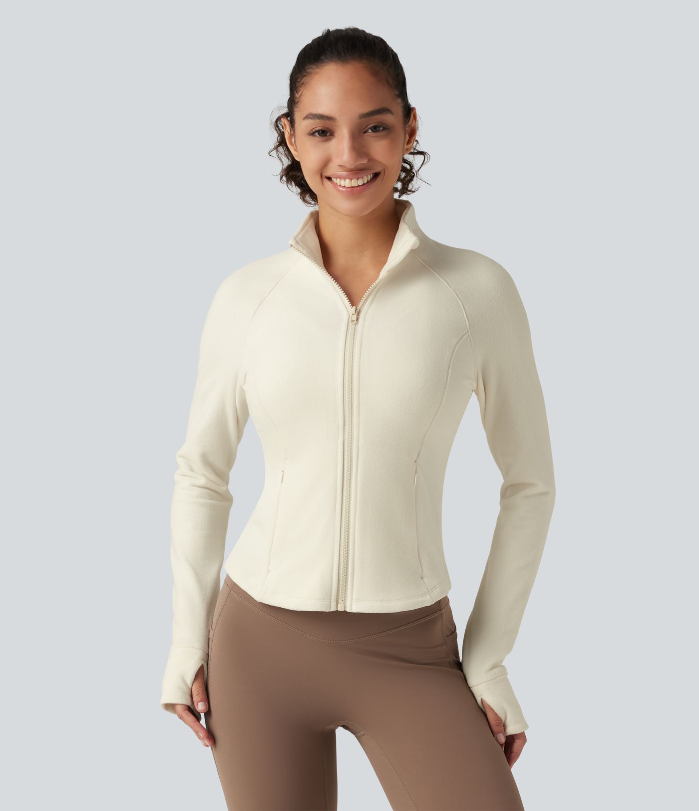 Veste de sport à col montant et manches longues avec poches