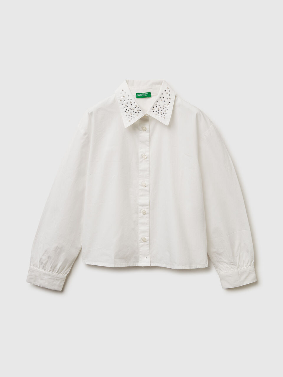 Shirt with jewel-effect applique