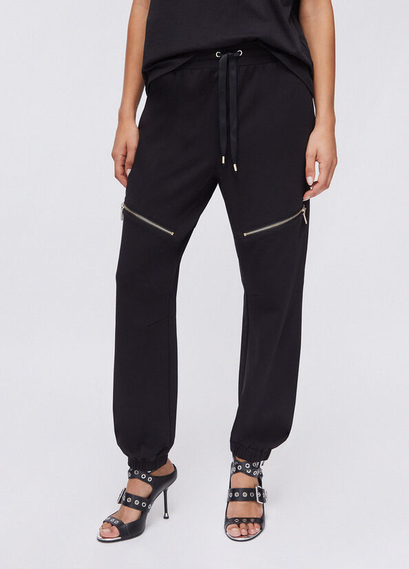 Pantaloni in felpa con zip