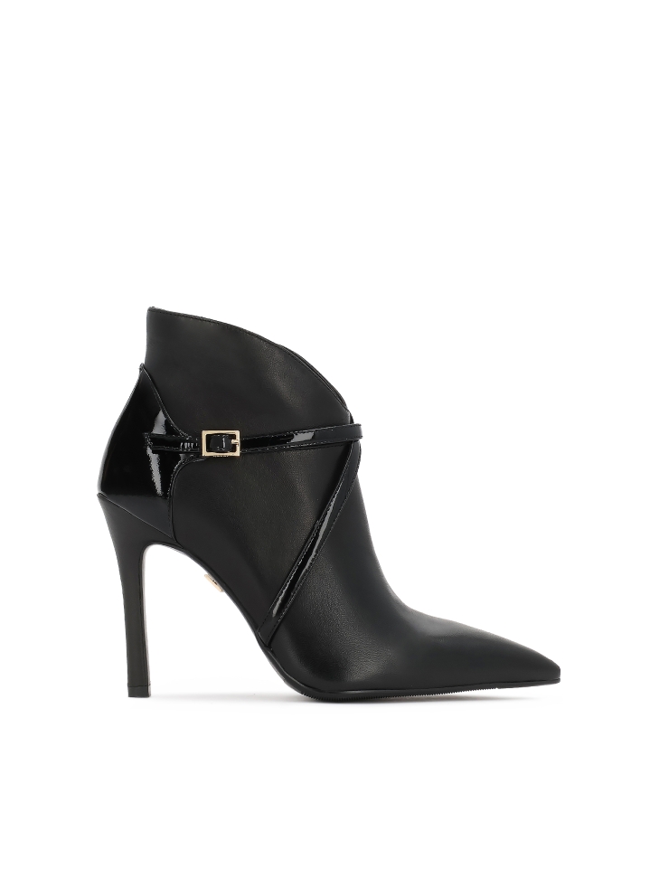 Heeled boots with contoured upper