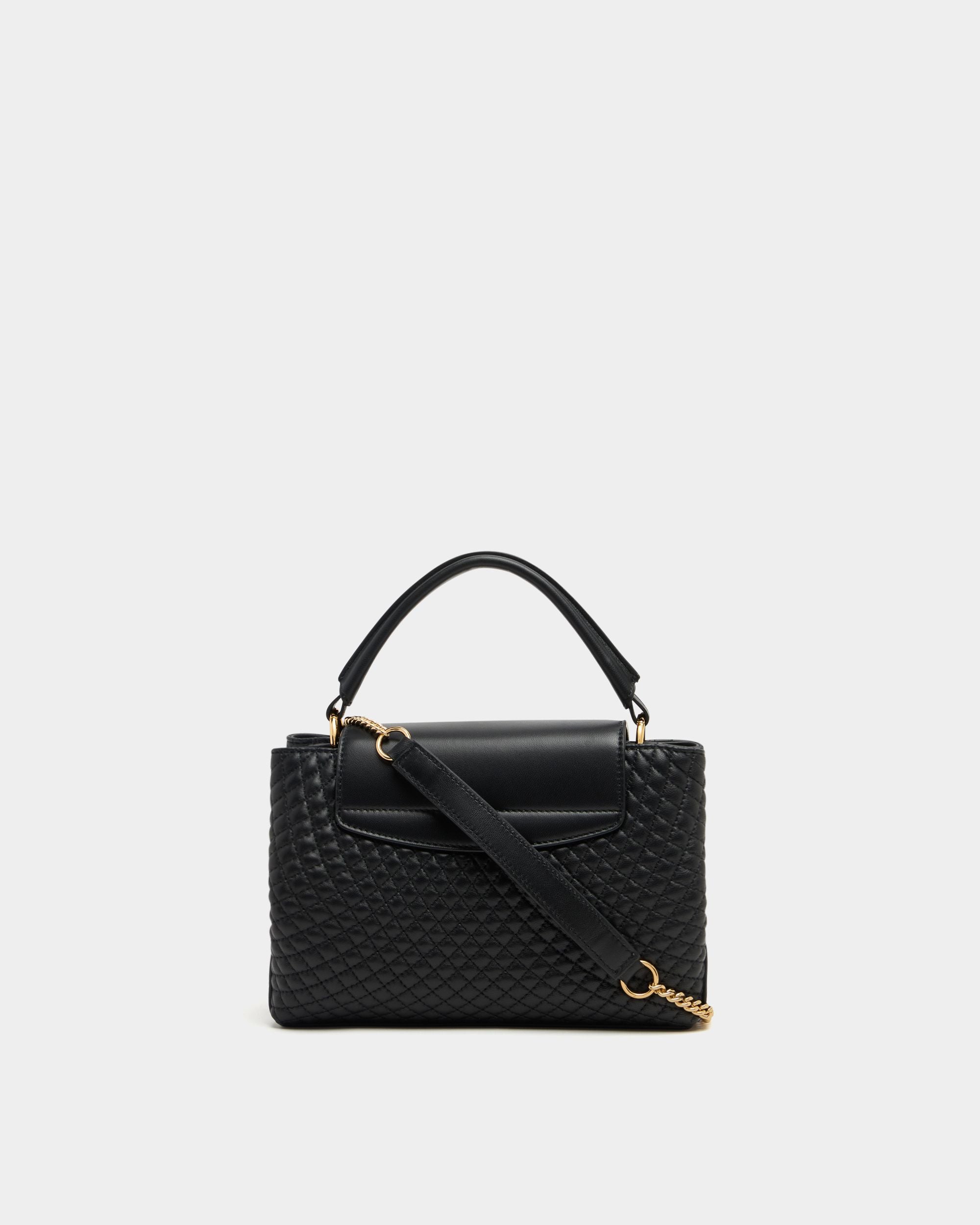 Kleine Henkeltasche Lock Me aus schwarzem, gestepptem Leder