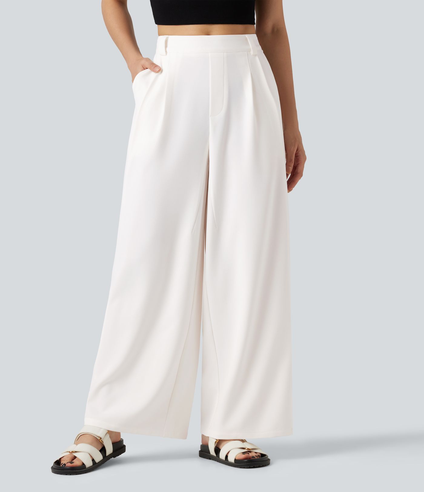 Pantalon tailleur large, taille moyenne, à poches